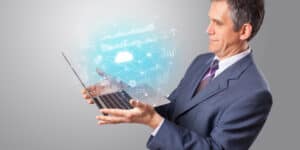 Man holding laptop