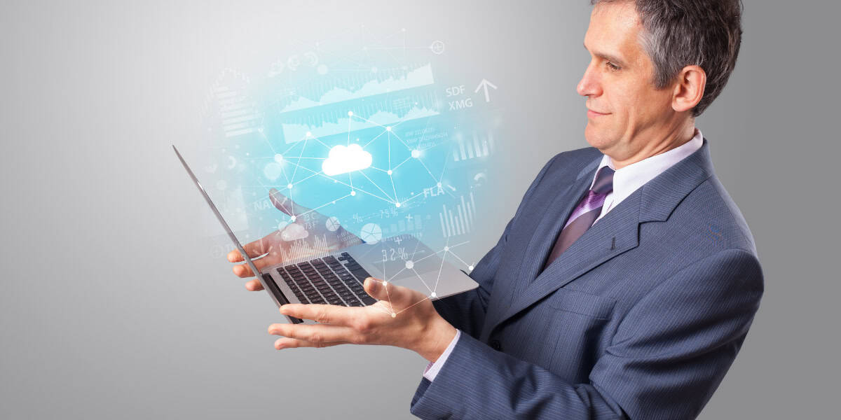 Man holding laptop