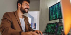 happy man on computer