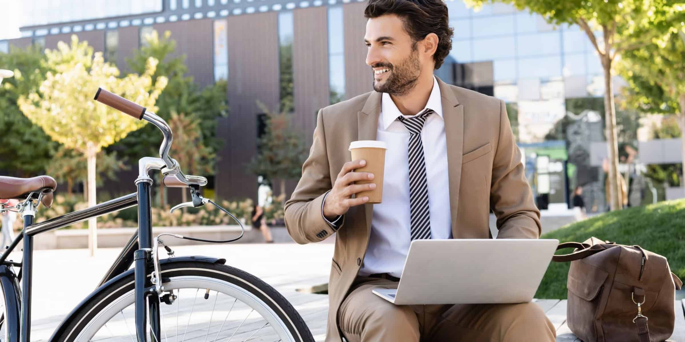 smartly dressed man on laptop.