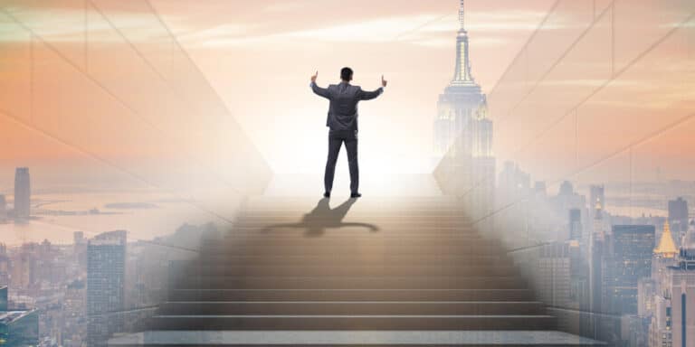 top of the world businessman