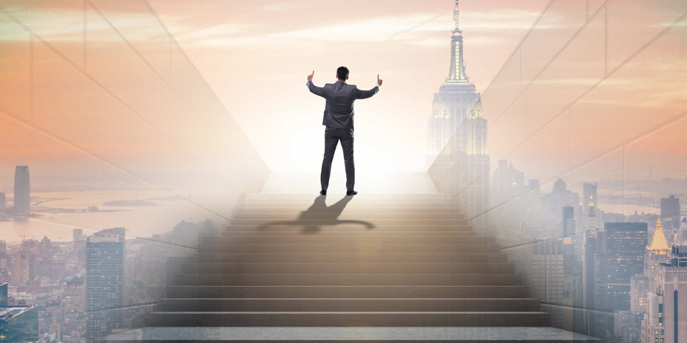 top of the world businessman