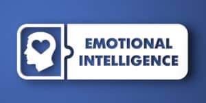 The word emotional intelligence on a blue background.
