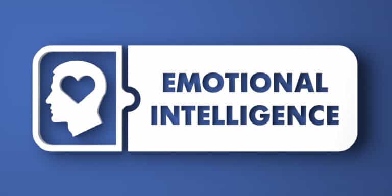 The word emotional intelligence on a blue background.
