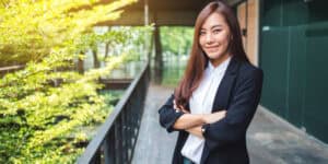 smart woman posing outside