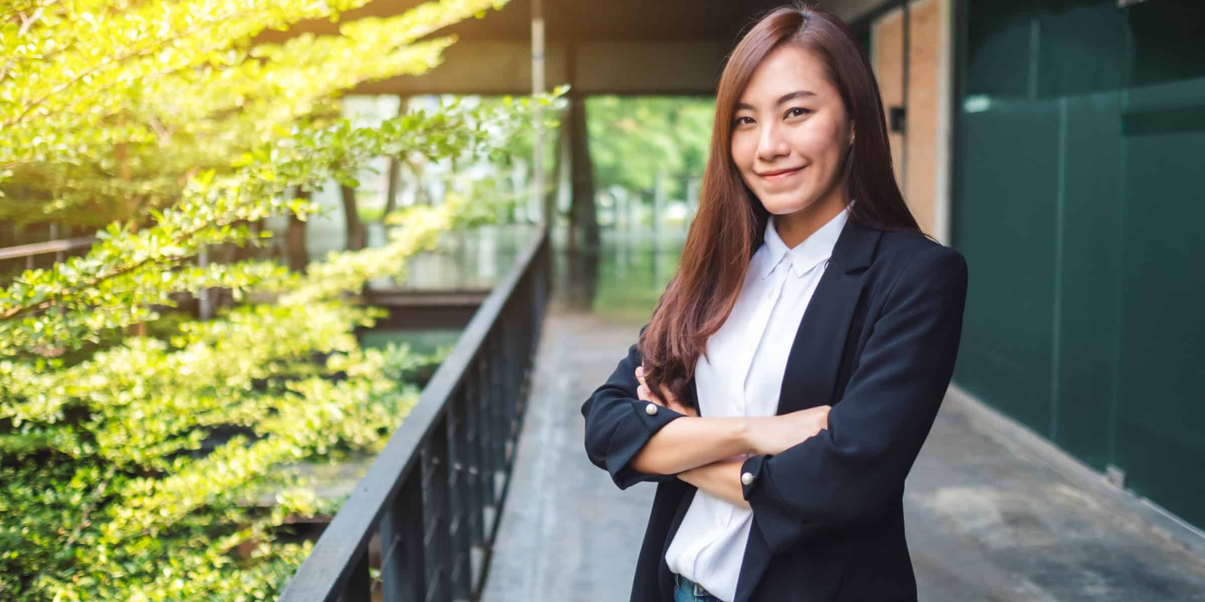 smart woman posing outside