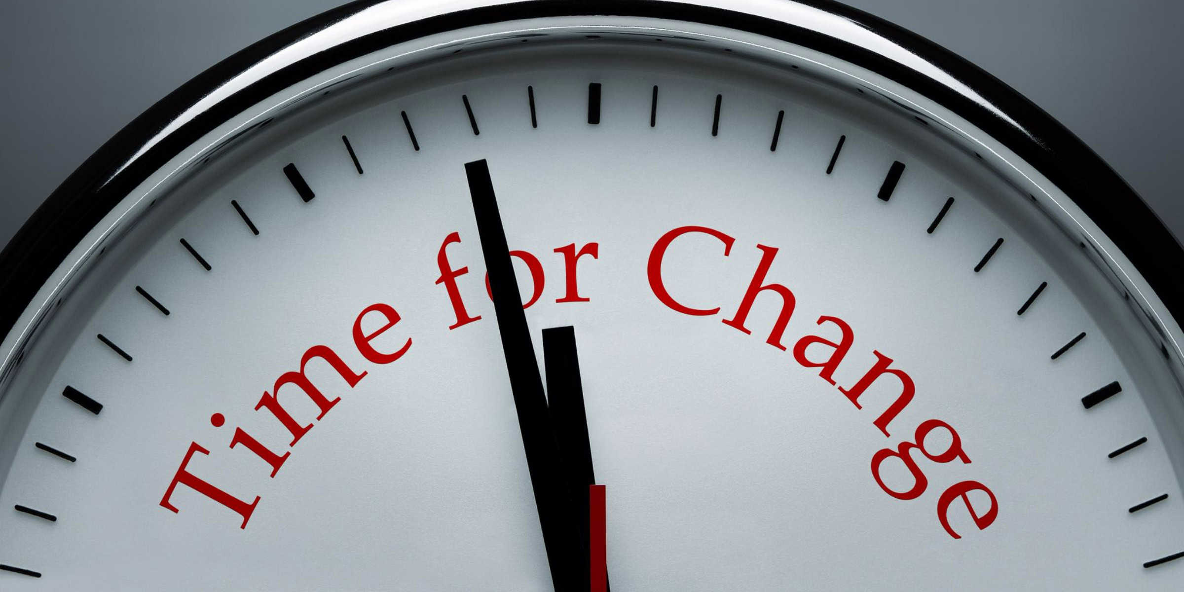 A clock with the words time for change on it.