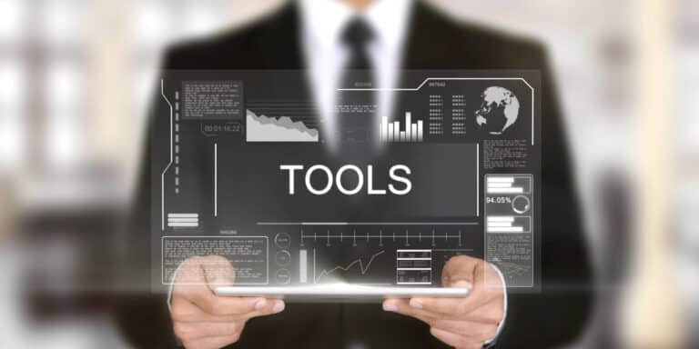 A businessman showcasing tools on a tablet.