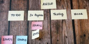 A group of sticky notes with the words agile on them.