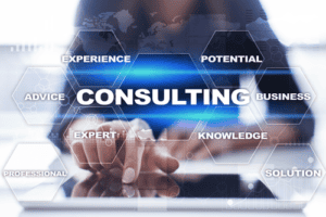 A woman is using a tablet with the word consulting on it.