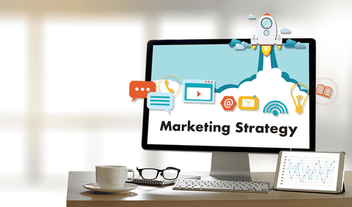 A computer screen with the word marketing strategy on it.