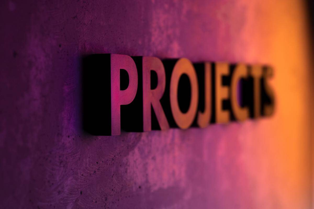 Image depicting a team working together on a project