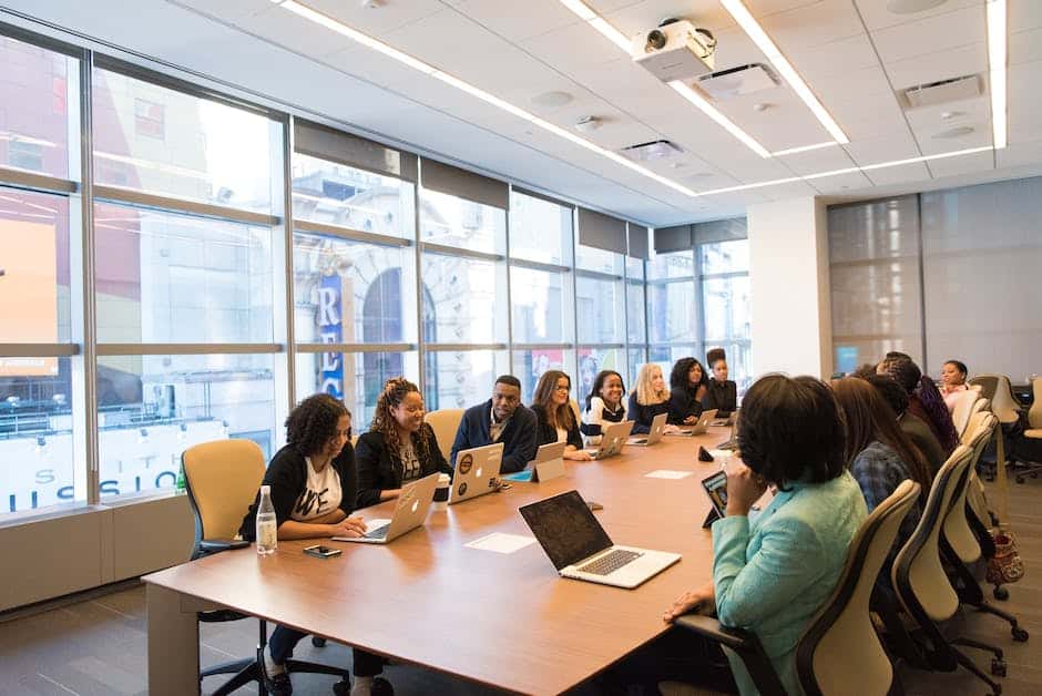 A descriptive image showing a group of business people discussing a case study.