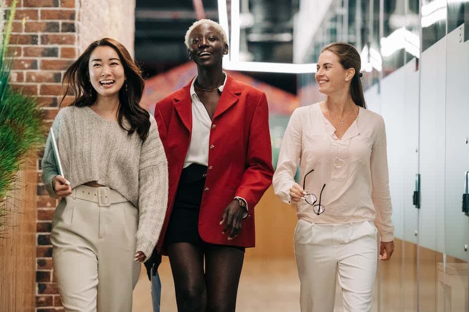 A team of diverse people working together to overcome challenges in organizational change management.